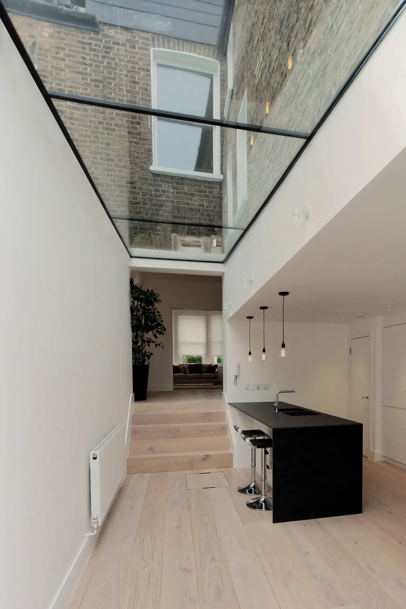 Kitchen to reception, with skylight in WC1