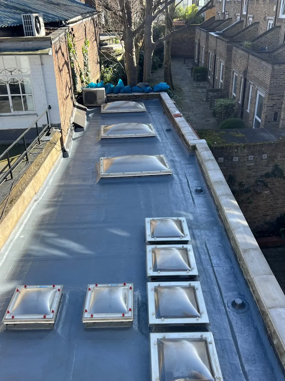 New flat roof with rooflights in N1