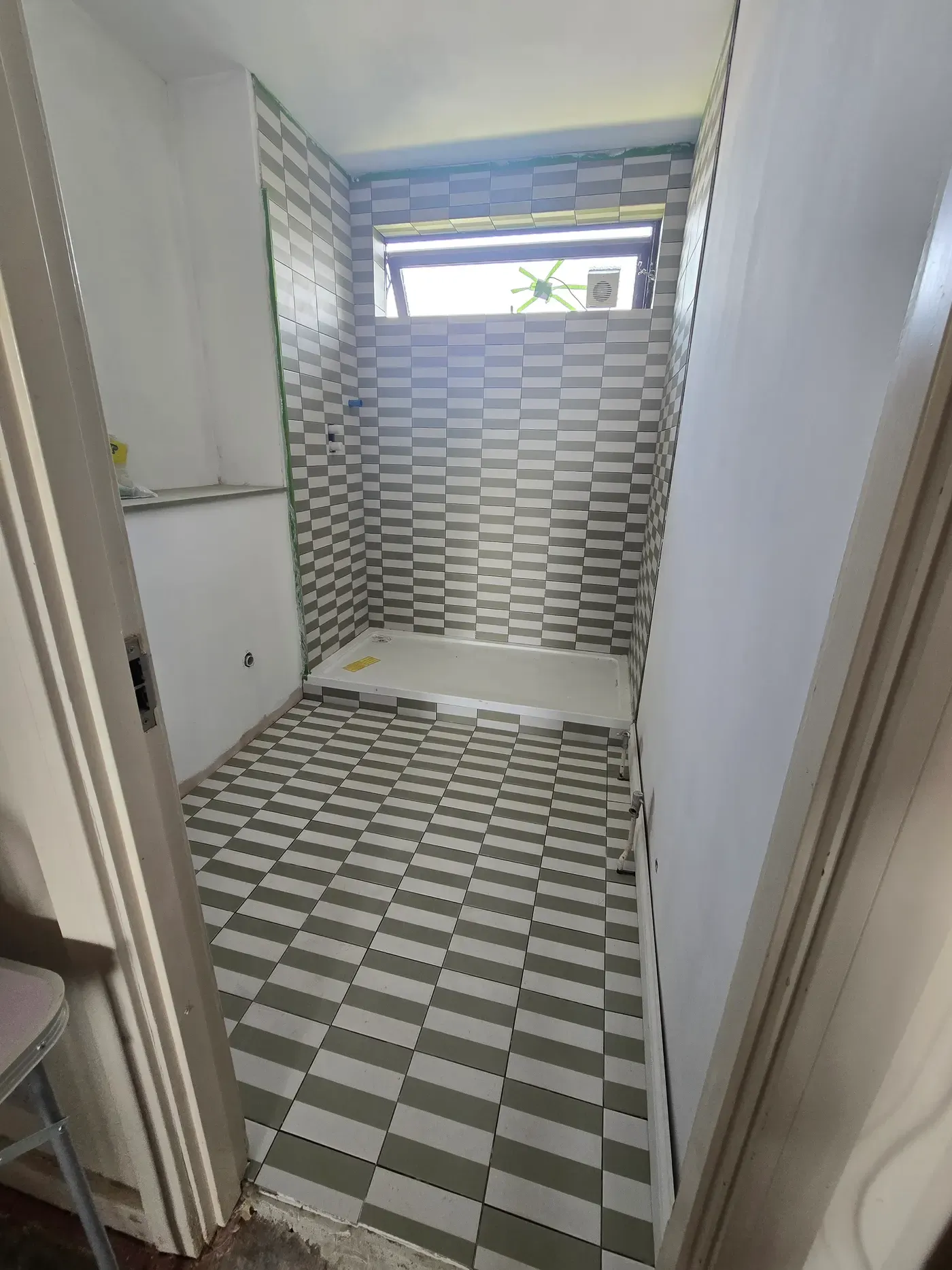 Shower room, newly tiled in SW3