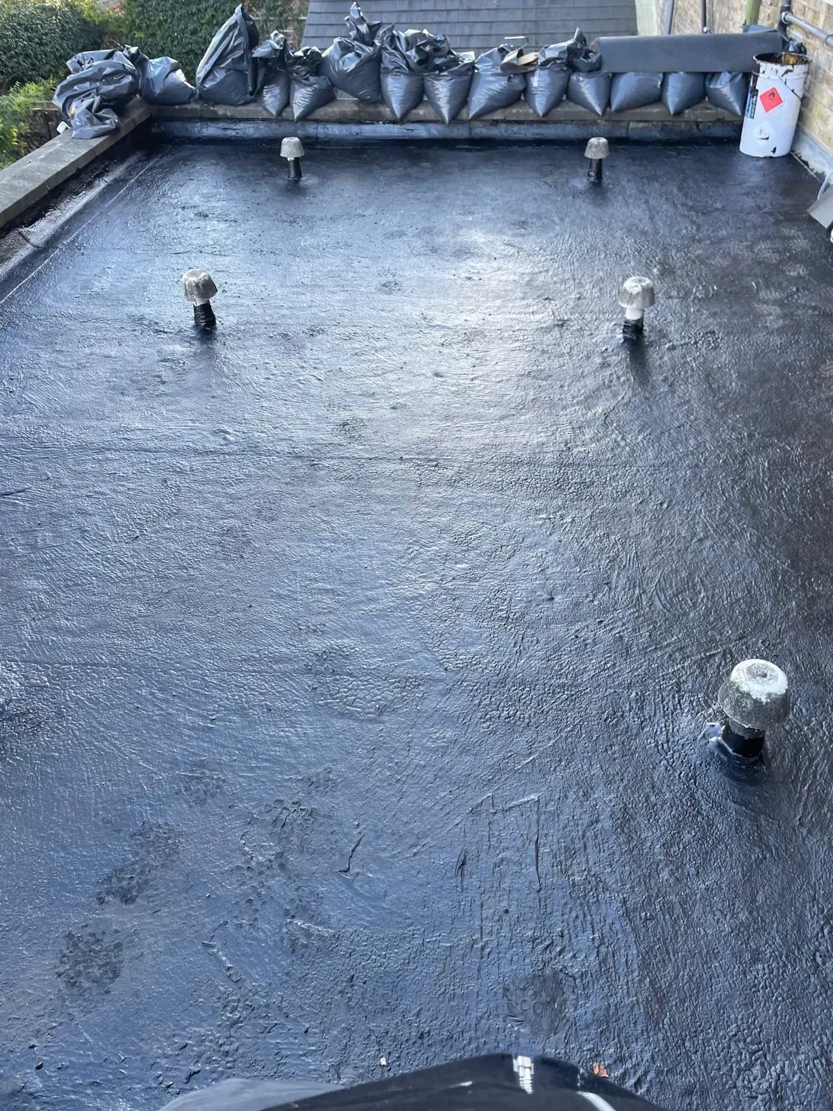 Coating a flat roof in SW6