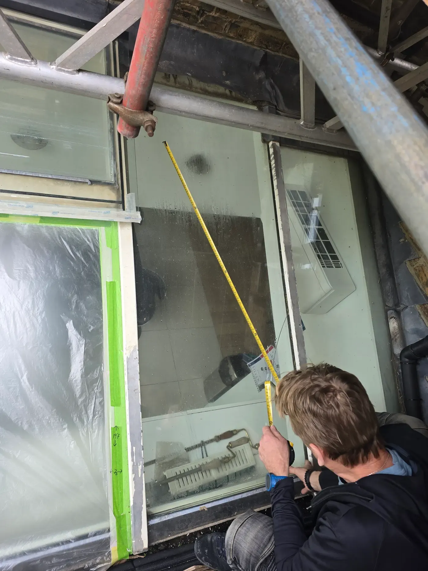 Measuring for new rooflight glass in SW6