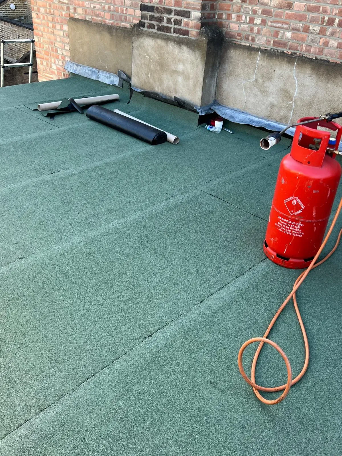 New flat roof in W8