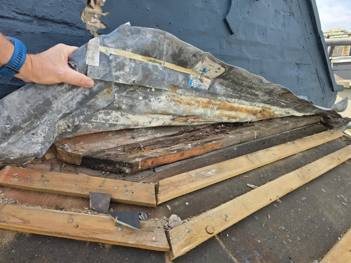 Roof repair in progress in SW6